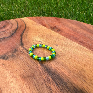 The Earth Ring with lime green, dark green, and blue beads.